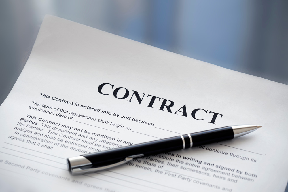 Pen on the contract papers